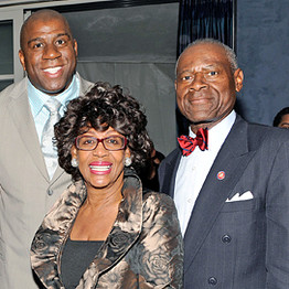 Rep. Maxine Waters, center, with Earvin "Magic" Johnson, left, and Ms. Waters's husband, Sidney Williams.